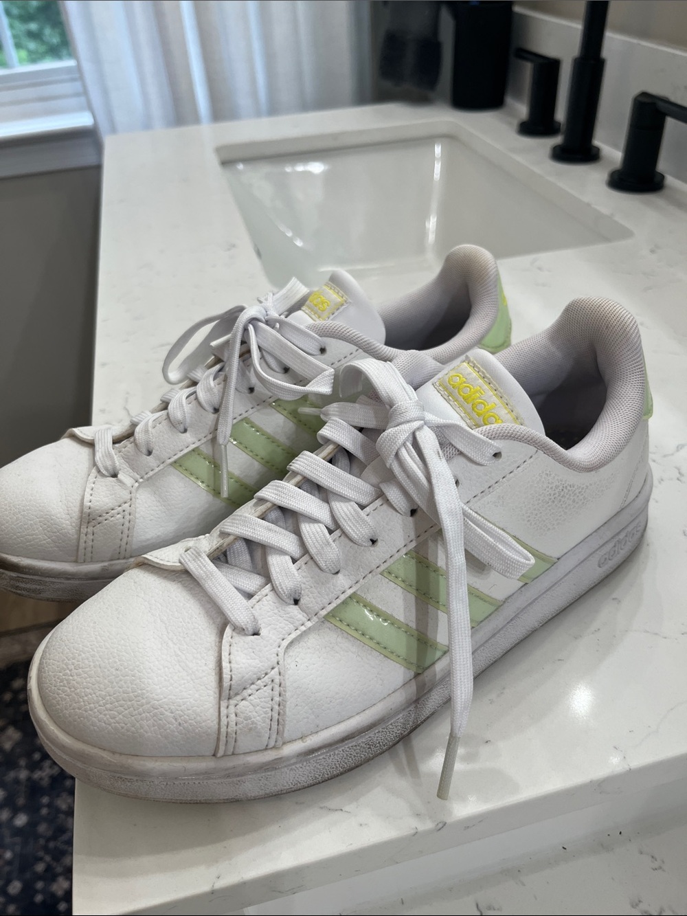 adidas Women’s White Sneakers with Light Green Stripes and yellow accents